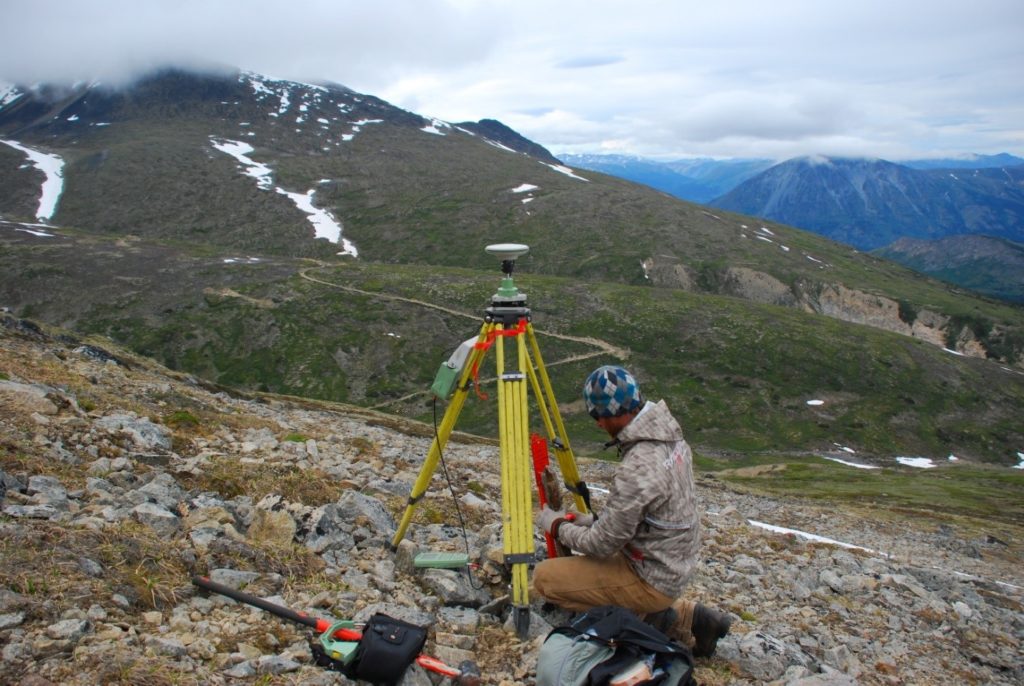 GPS land surveyor at coffee creek